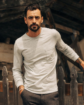 fit model posing in The Cotton Hemp Long Sleeve Tee in Heather Grey, Knits by Taylor Stitch