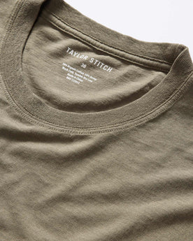 material shot of the neck opening on The Cotton Hemp Tee in Olive, Knits by Taylor Stitch