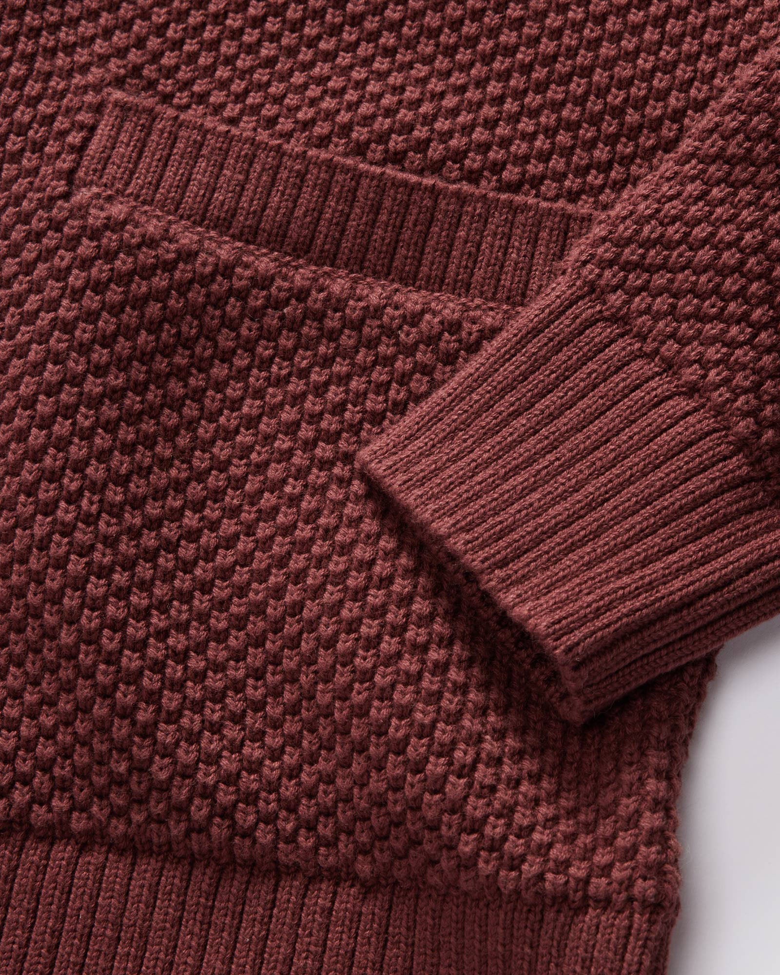 material shot of the sleeves on The Crawford Sweater in Black Cherry, Knits by Taylor Stitch