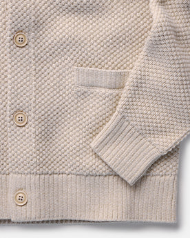 material shot of the sleeves on The Crawford Sweater in Marled Natural, Knits by Taylor Stitch