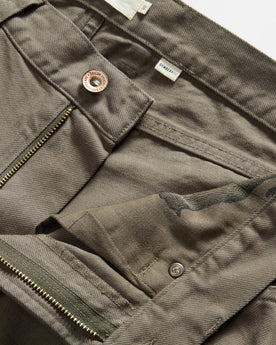 material shot of the waistband on The Democratic All Day Pant in Fatigue Olive Selvage Denim, Bottoms by Taylor Stitch