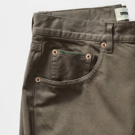 material shot of the pockets on The Democratic All Day Pant in Fatigue Olive Selvage Denim