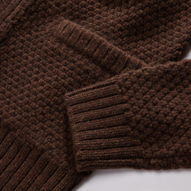 material shot of the ribbed cuffs and hem on The Fisherman Shawl Cardigan in Marsh Heather