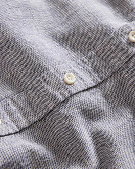 material shot of the buttons on The Jack in Blue Sky Slub Cotton Linen, Wovens by Taylor Stitch