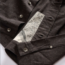 material shot of the inside pocket on The Long Haul Jacket in Peat Nep Herringbone