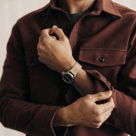 fit model adjusting his sleevs in The Maritime Shirt Jacket in Black Cherry Moleskin