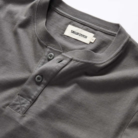 material shot of the collar on The Organic Cotton Henley in Faded Black
