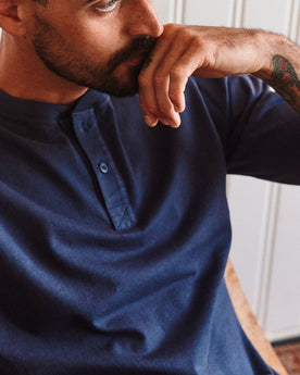 fit model posing in The Organic Cotton Henley in Navy, Knits by Taylor Stitch