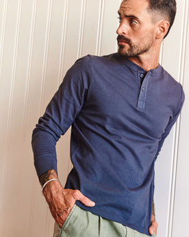 fit model posing in The Organic Cotton Henley in Navy, Knits by Taylor Stitch