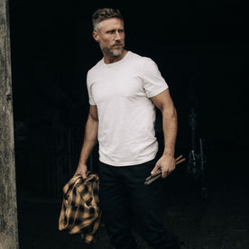 fit model walking wearing The Organic Cotton Tee in Vintage White