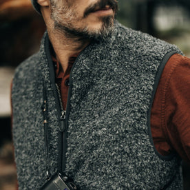 fit model showing off the collar on The Port Vest in Coal Marl Boucle Fleece