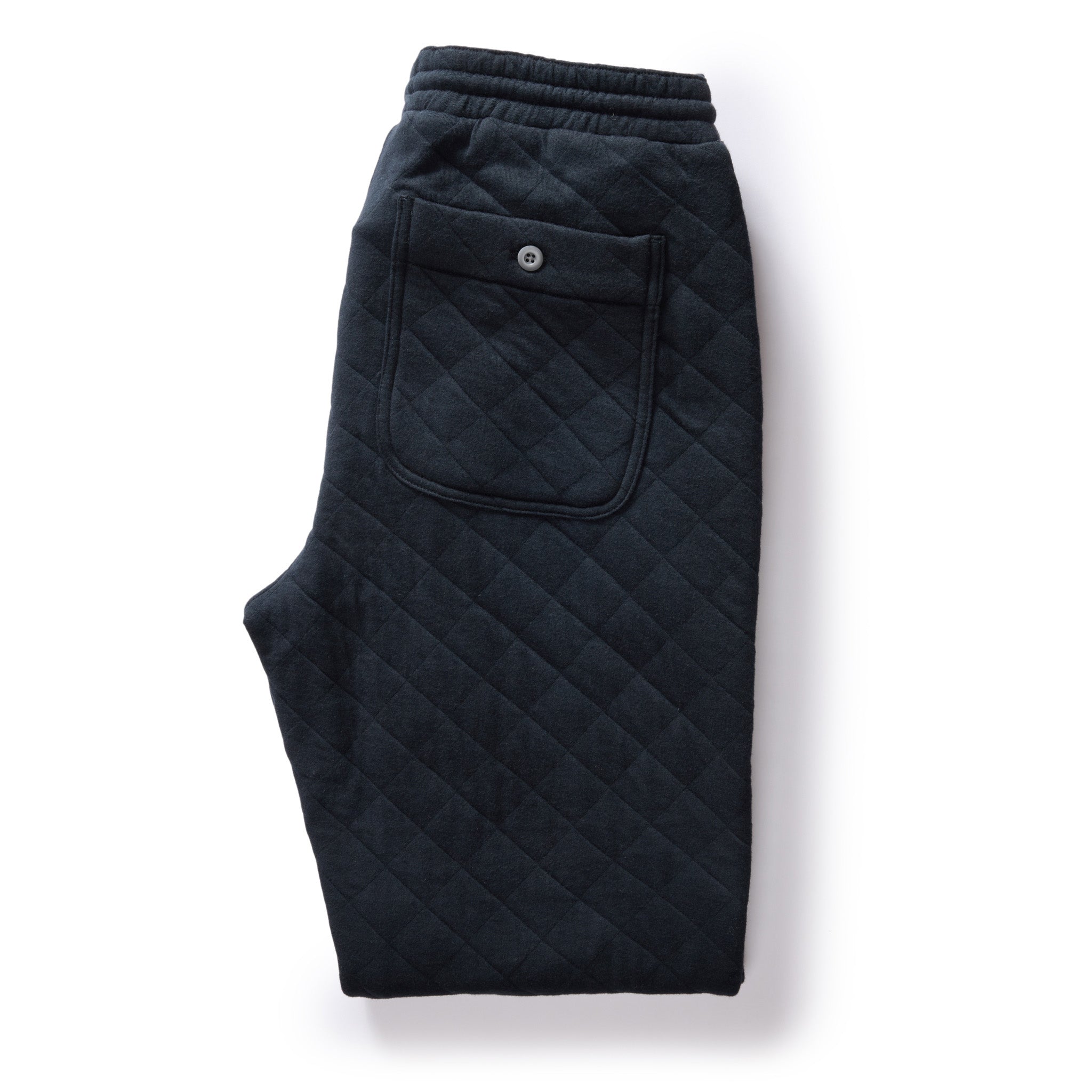 flatlay of The Quilted Jersey Pant in Midnight Heather, shown folded from the back, Bottoms by Taylor Stitch