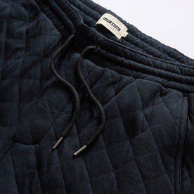 material shot of the drawcords on The Quilted Jersey Pant in Midnight Heather