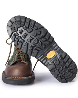 material shot of the vibram soles of The Ridge Boot in Painted Camo, Footwear by Taylor Stitch