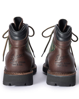 material shot of the Danner logo on the back of The Ridge Boot in Painted Camo, Footwear by Taylor Stitch