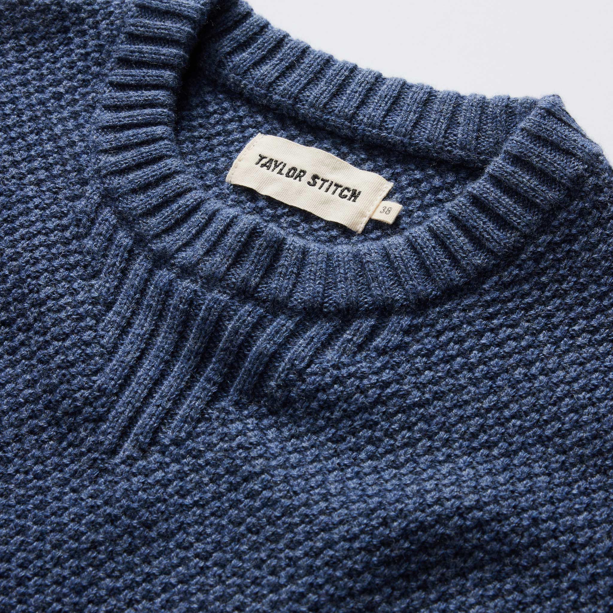 material shot of the collar on The Russell Sweater in Heather Blue, Knits by Taylor Stitch
