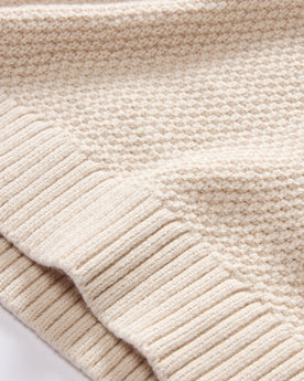 material shot of the bottom of The Russell Sweater in Heather Oat, Knits by Taylor Stitch