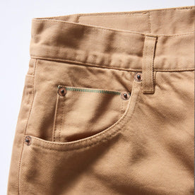 material shot of the pocket on The Slim All Day Pant in Tobacco Selvage Denim