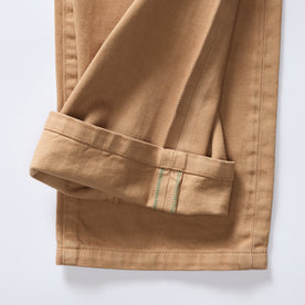 material shot of the selvage cuffs on The Slim All Day Pant in Tobacco Selvage Denim