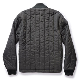 flatlay of The Able Jacket in Faded Black Quilted Nylon, shown from the back