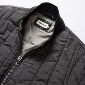material shot of the collar on The Able Jacket in Faded Black Quilted Nylon