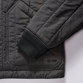 material shot of the cuffs on The Able Jacket in Faded Black Quilted Nylon