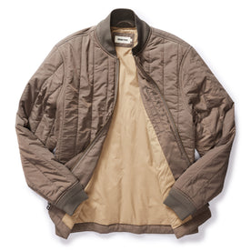 flatlay of The Able Jacket in Morel Quilted Nylon, shown open