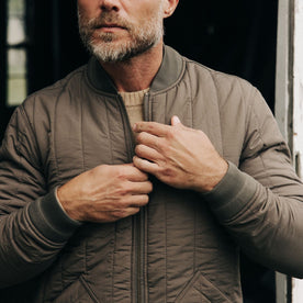 fit model zipping The Able Jacket in Morel Quilted Nylon