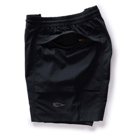 material shot of the hidden zipper pocket on The Challenge Cargo Short in Black