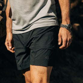 fit model walking in The Challenge Cargo Short in Black