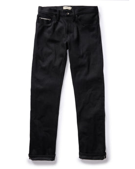 flatlay of The Democratic Jean in Black Nihon Menpu Selvage, shown in full, Bottoms by Taylor Stitch