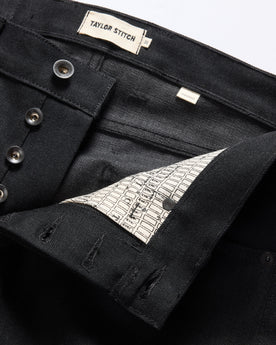 material shot of the button fly on The Democratic Jean in Black Nihon Menpu Selvage, Bottoms by Taylor Stitch