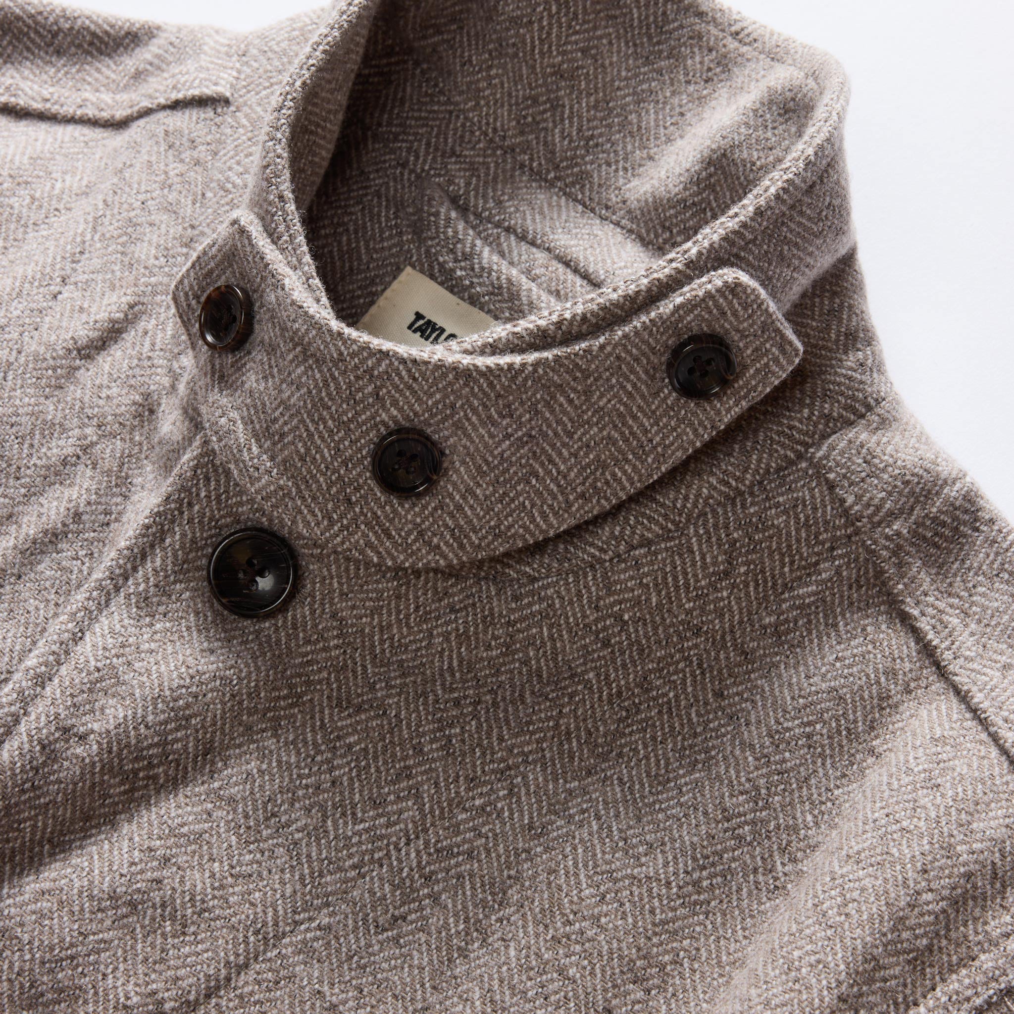 material shot of the throat latch on The Gibson Jacket in Heathered Oat Nep Herringbone, Outerwear by Taylor Stitch