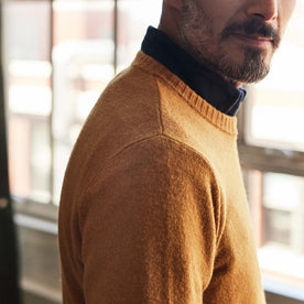 fit model showing the side of The Lodge Sweater in Gold