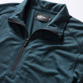 material shot of the collar on The Merino Half Zip in Forest