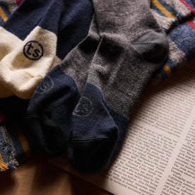 material shot of TS logo on The Merino Sock in Charcoal