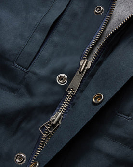 material shot of the zipper on The Pathfinder Jacket in Dark Navy Dry Wax, Outerwear by Taylor Stitch