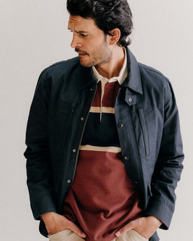 fit model posing in The Pathfinder Waxed Canvas Jacket in Dark Navy Dry Wax, Outerwear by Taylor Stitch
