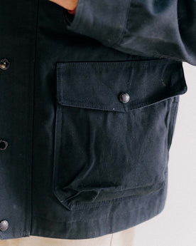 fit model posing in The Pathfinder Jacket in Dark Navy Dry Wax, Outerwear by Taylor Stitch
