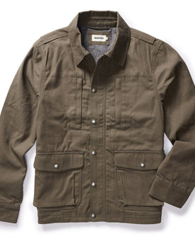 flatlay of The Pathfinder Jacket in Fatigue Olive Dry Wax, Outerwear by Taylor Stitch