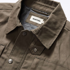 material shot of the collar on The Pathfinder Jacket in Fatigue Olive Dry Wax