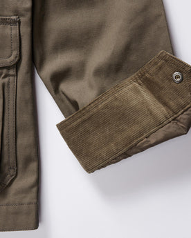 material shot of the cuffs on The Pathfinder Jacket in Fatigue Olive Dry Wax, Outerwear by Taylor Stitch