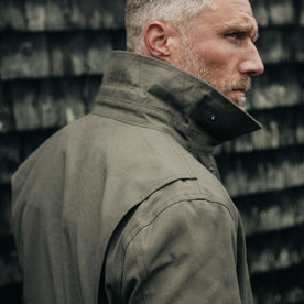 fit model showing off collar on The Pathfinder Jacket in Fatigue Olive Dry Wax