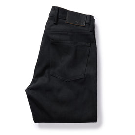 flatlay of The Slim Jean in Black Nihon Menpu Selvage, shown folded from back