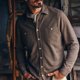 fit model with his hands in his pockets wearing The Utility Shirt in Fatigue Olive French Terry Twill Knit