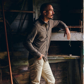 fit model posing in The Utility Shirt in Fatigue Olive French Terry Twill Knit