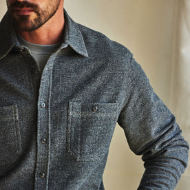 fit model showing off pockets on The Utility Shirt in Navy French Terry Twill Knit