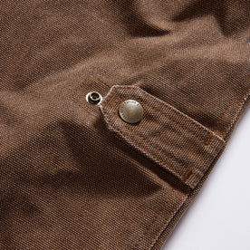 material shot of the cinching detail on The Workhorse Vest in Aged Penny Chipped Canvas