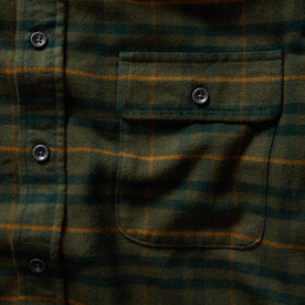 material shot of the front chest pocket on The Yosemite Shirt in Dark Forest Plaid