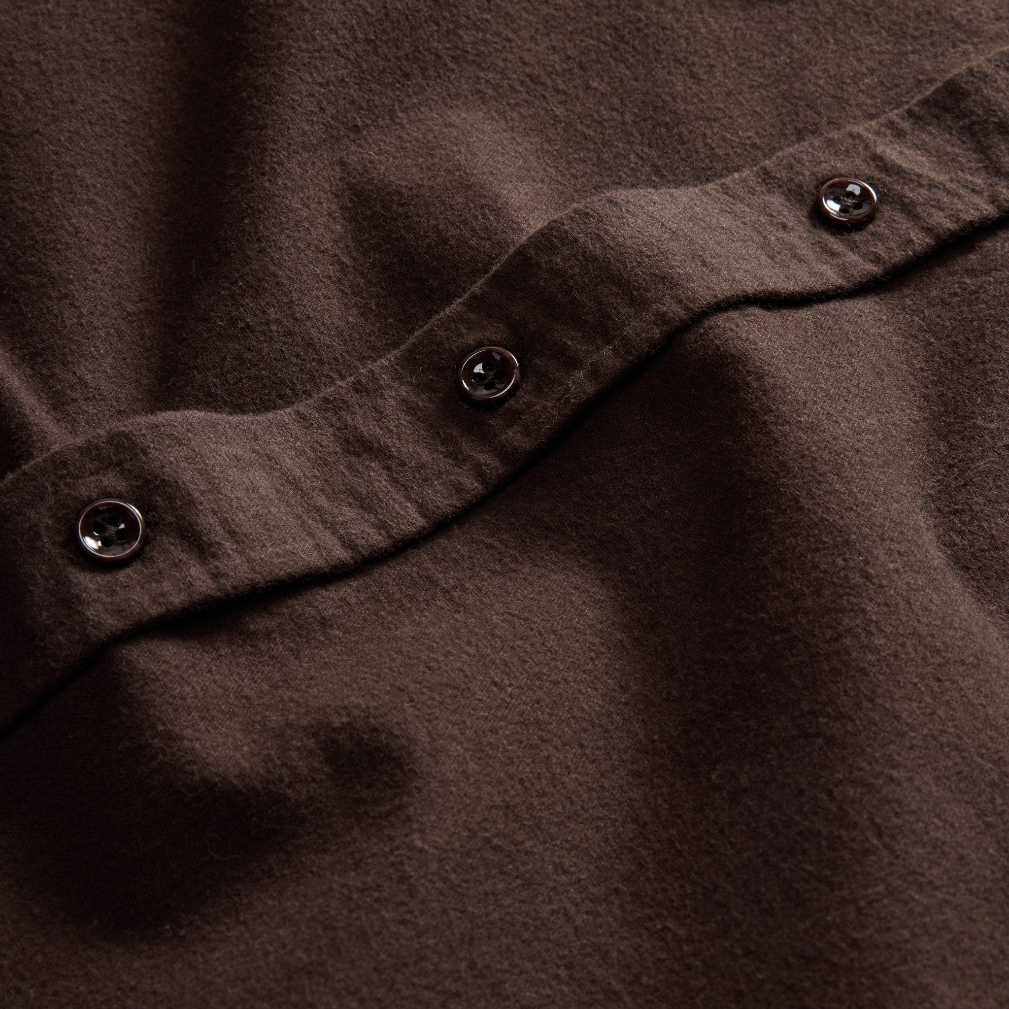 material shot of the buttons on The Yosemite Shirt in Soil, Wovens by Taylor Stitch